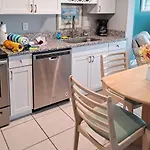 Beachfront Garden City Condo With Balcony And Pool
