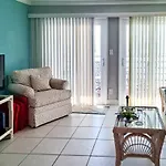 Beachfront Garden City Condo With Balcony And Pool