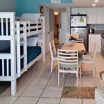 Beachfront Garden City Condo With Balcony And Pool