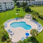 Beautifully Decorated 3 Bedroom 2 Bath Condo, First Floor Wth Walk In Shower! Located In Golf Community