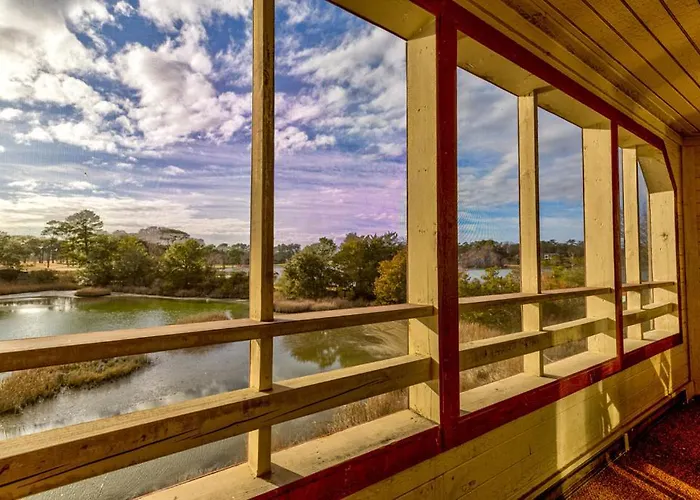 Beautiful Views Of Marsh Water Golf Course Near The Beach And A Pier Nearby