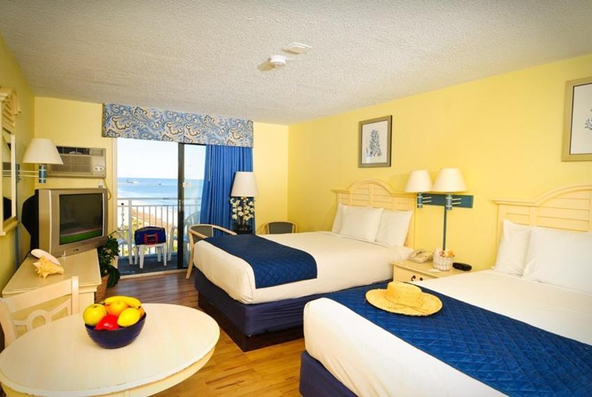 Driftwood And Tides By Sea Mist Aparthotel